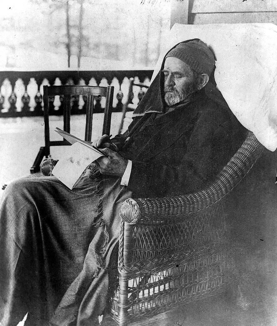 Ulysses Grant seduto su una sedia in rattan, mentre scrive le sue memorie, a Mount McGregor vicino a Saratoga Springs, N.Y.